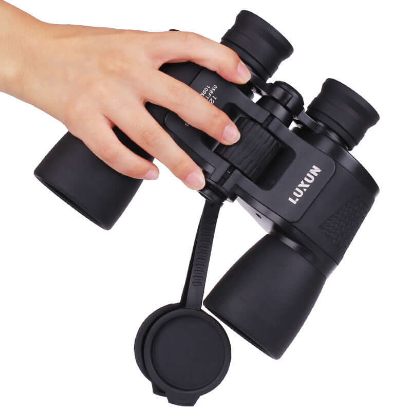 Military HD Night Vision Binoculars being held in hand, showcasing a stylish design and durable waterproof features.